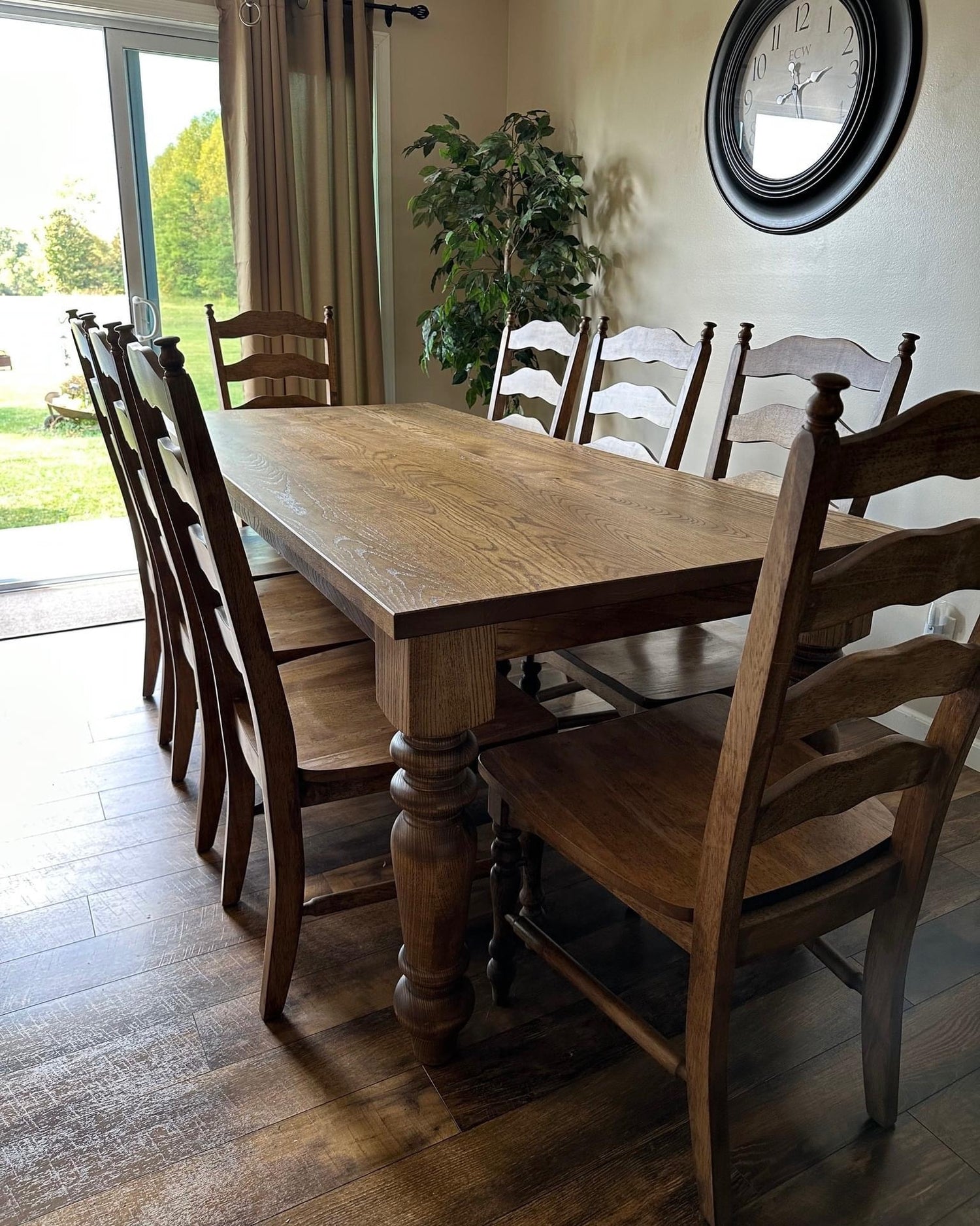 Traditional wood dining table with ladderback chairs